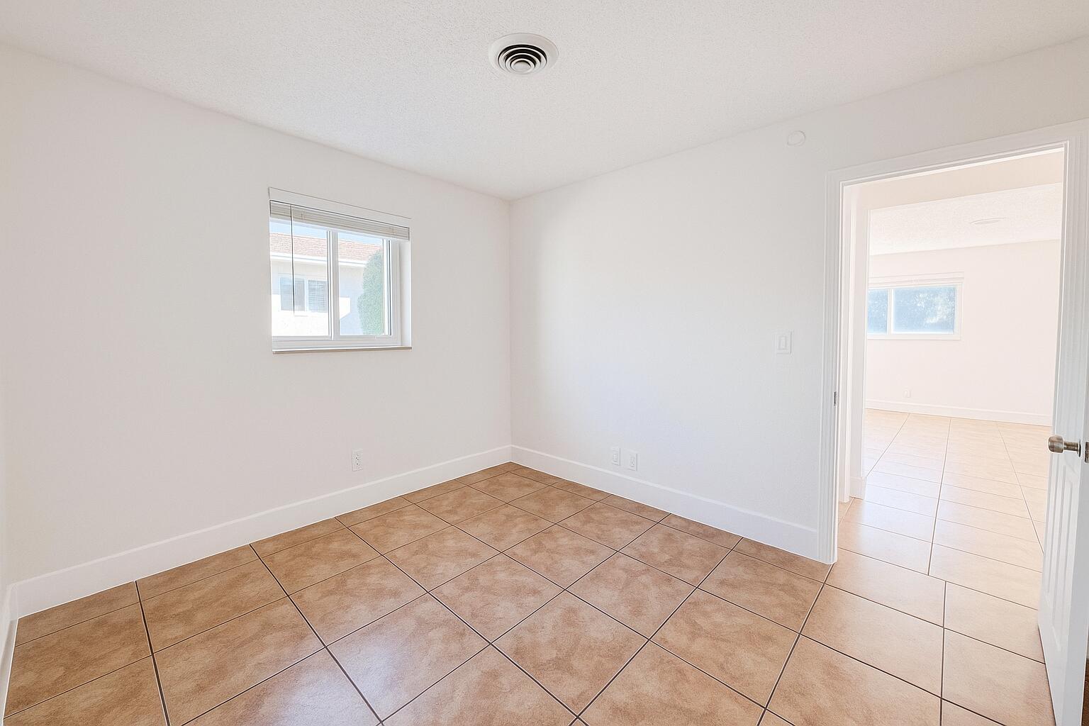 2920 Northeast 7th Avenue, Unit A Pompano Beach, FL 33064 - Photo 9 of 16 Master Bedroom