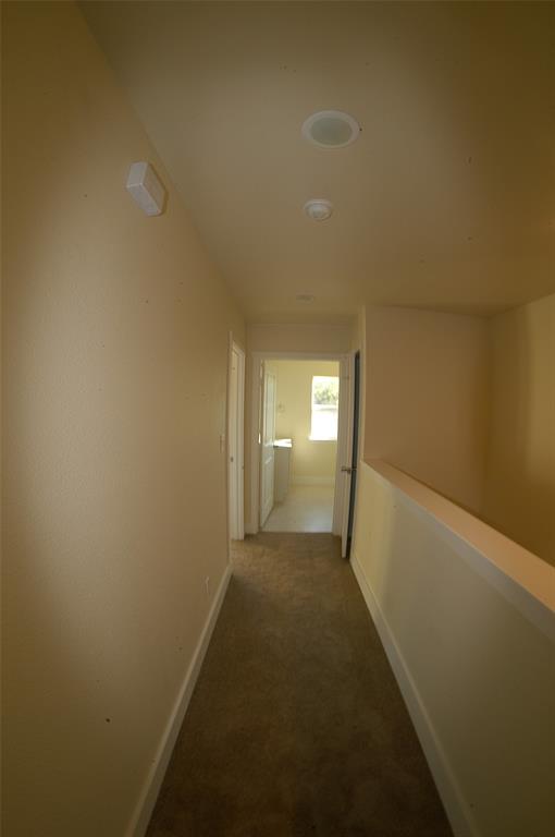 621 East Murray Street Denison, TX 75021 - Photo 18 of 31 a view of hallway with window