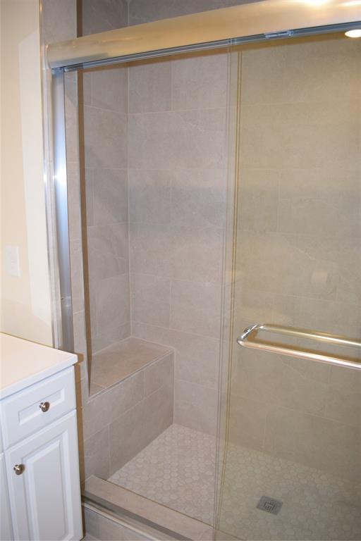 621 East Murray Street Denison, TX 75021 - Photo 27 of 31 a bathroom with a shower