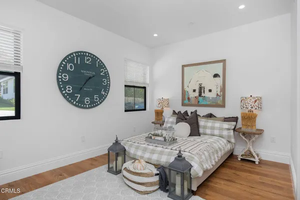 a bathroom with a double vanity sink and mirror