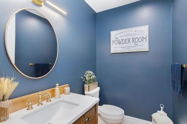 a view of a living room and dining room