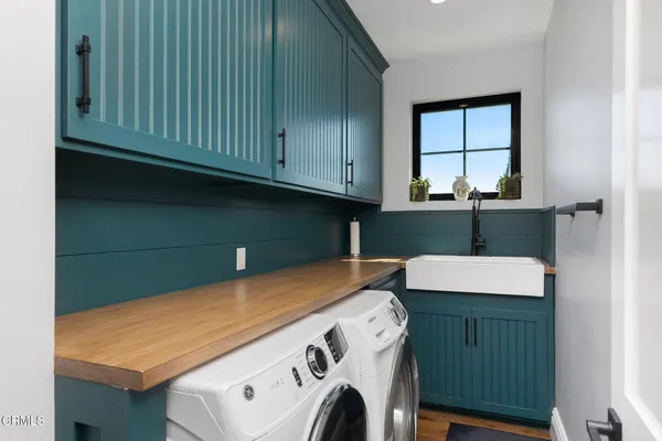 a front view of a house with swimming pool