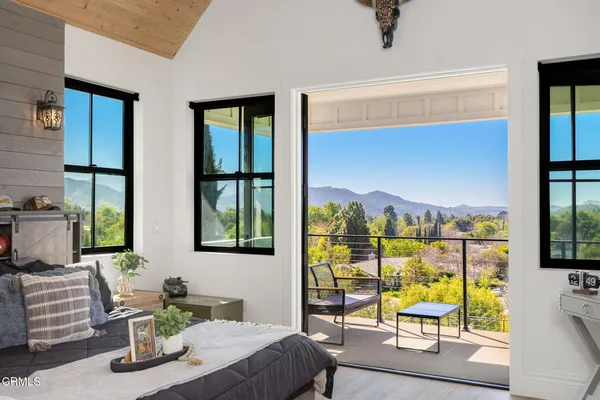a front view of house with yard and seating area