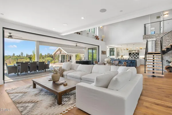 a kitchen with a sink stainless steel appliances and cabinets