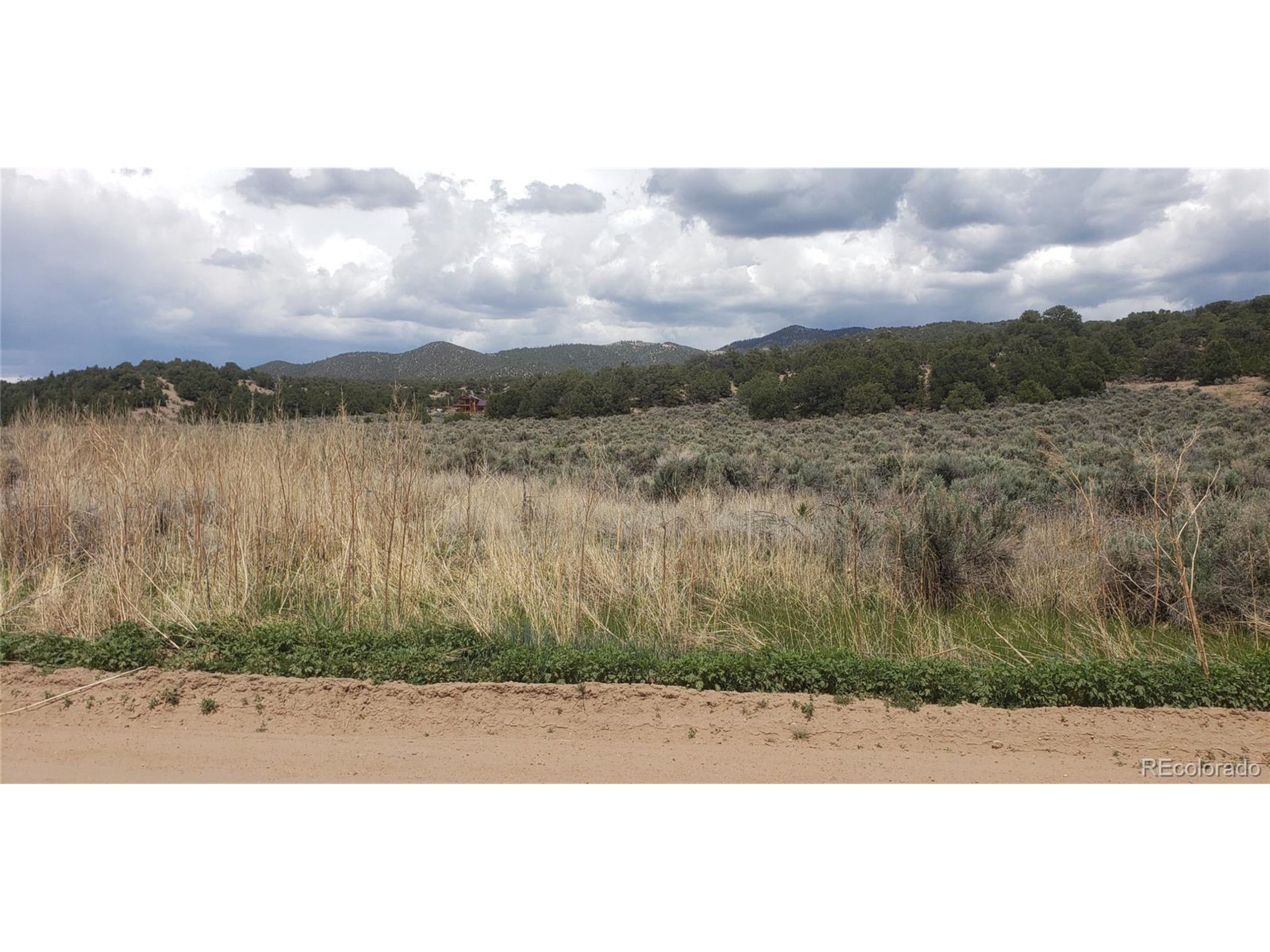 1505 Juarez & Dunn Road San Luis, CO 81152 - Photo 12 of 18 a view of a lake with a city