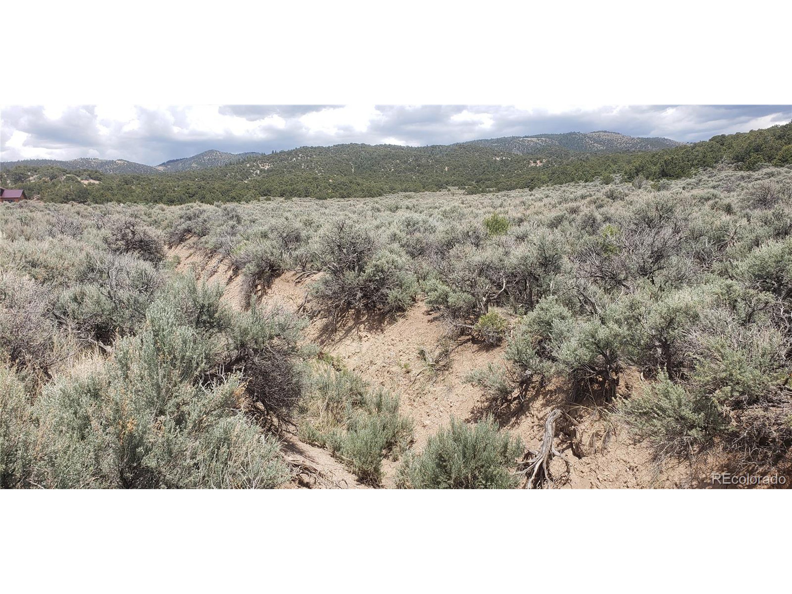 1505 Juarez & Dunn Road San Luis, CO 81152 - Photo 6 of 18 a view of a mountain from a yard