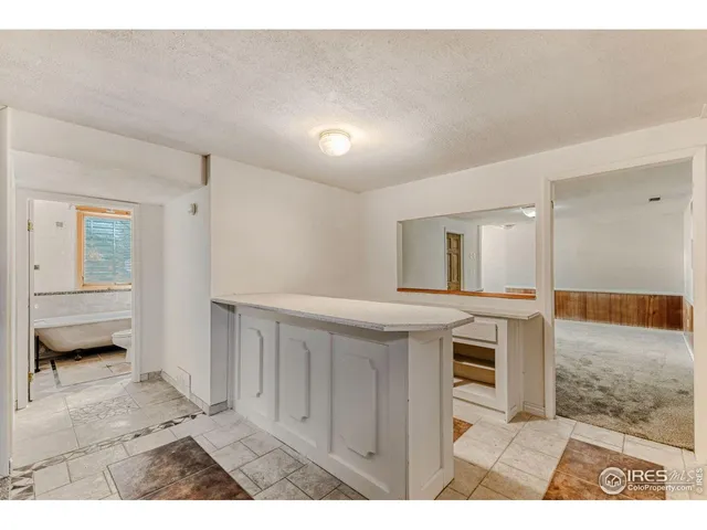 a bathroom with a bathtub and a sink