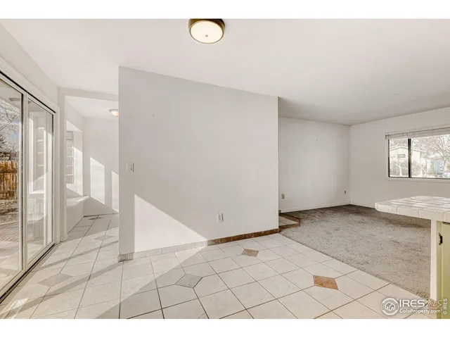 a kitchen with stainless steel appliances granite countertop a sink and a stove