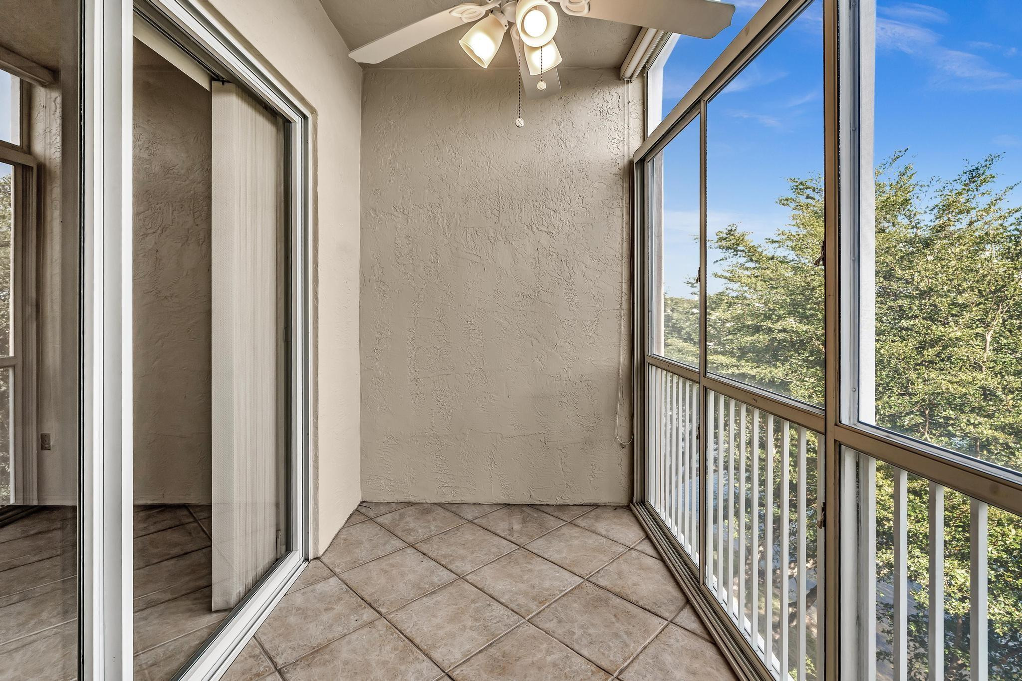 9551 Weldon Circle, Unit E411 Tamarac, FL 33321 - Photo 34 of 78 a view of a balcony