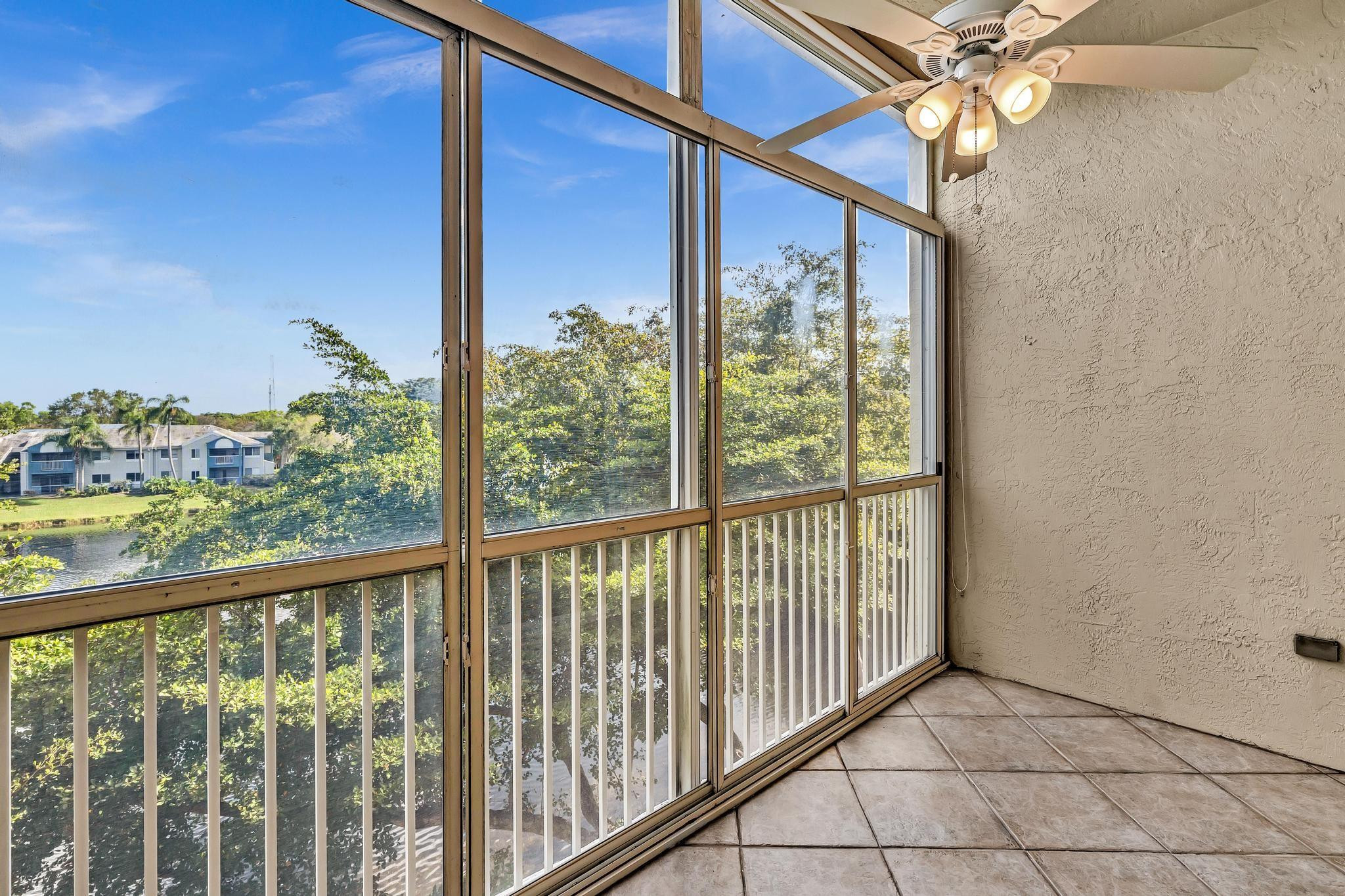 9551 Weldon Circle, Unit E411 Tamarac, FL 33321 - Photo 35 of 78 a view of a balcony with a street