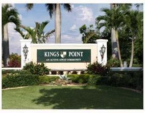 9551 Weldon Circle, Unit E411 Tamarac, FL 33321 - Photo 77 of 78 a sign that is sitting on a brick wall