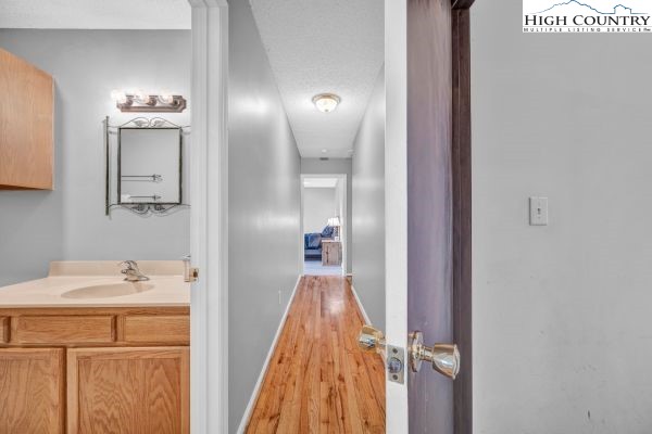 260 Smokey Road Newland, NC 28657 - Photo 20 of 43 a en suite bathroom with a sink