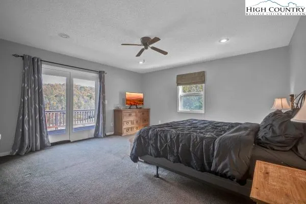 a bedroom with a bed and a cabinets