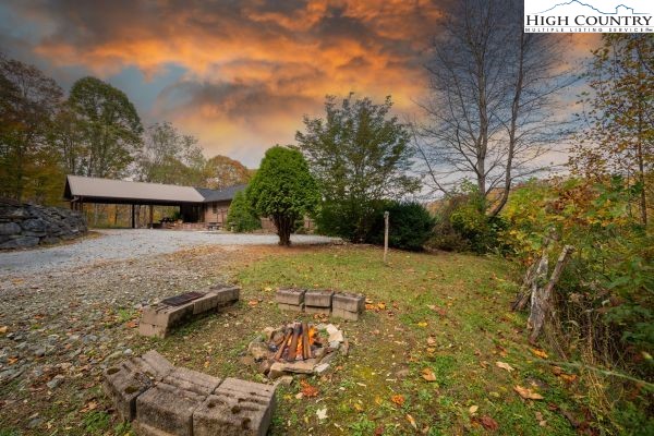 260 Smokey Road Newland, NC 28657 - Photo 3 of 43 a view of a house with yard and sitting area