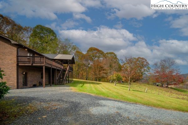 260 Smokey Road Newland, NC 28657 - Photo 34 of 43 a view of a house with backyard