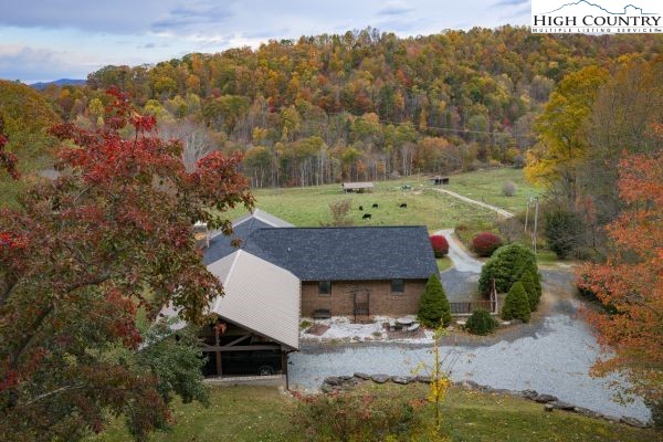 260 Smokey Road Newland, NC 28657 - Photo 41 of 43 an aerial view of a house with a yard