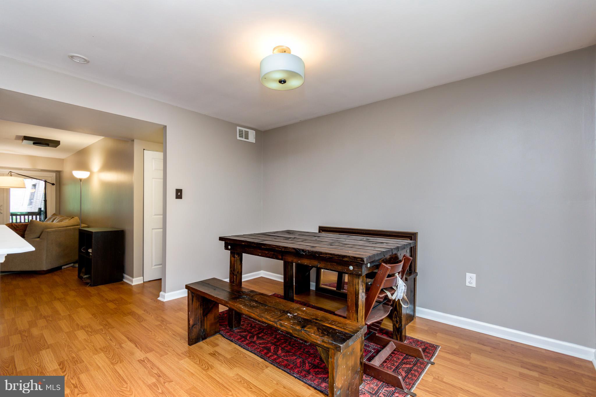 5236 West Running Brook Road, Unit 302 Columbia, MD 21044 - Photo 11 of 25 a living room with furniture
