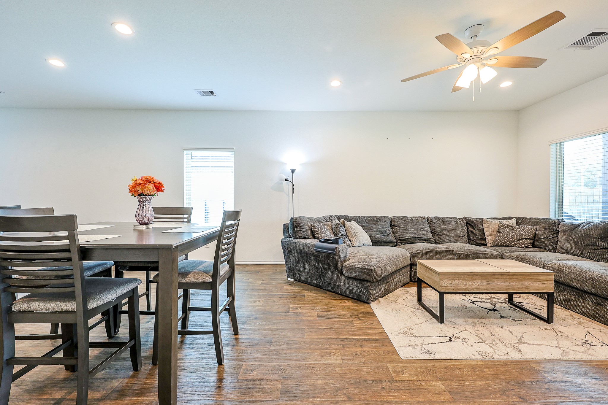 22603 Aspen Tarn Trail Spring, TX 77373 - Photo 5 of 20 a living room with furniture and a chandelier