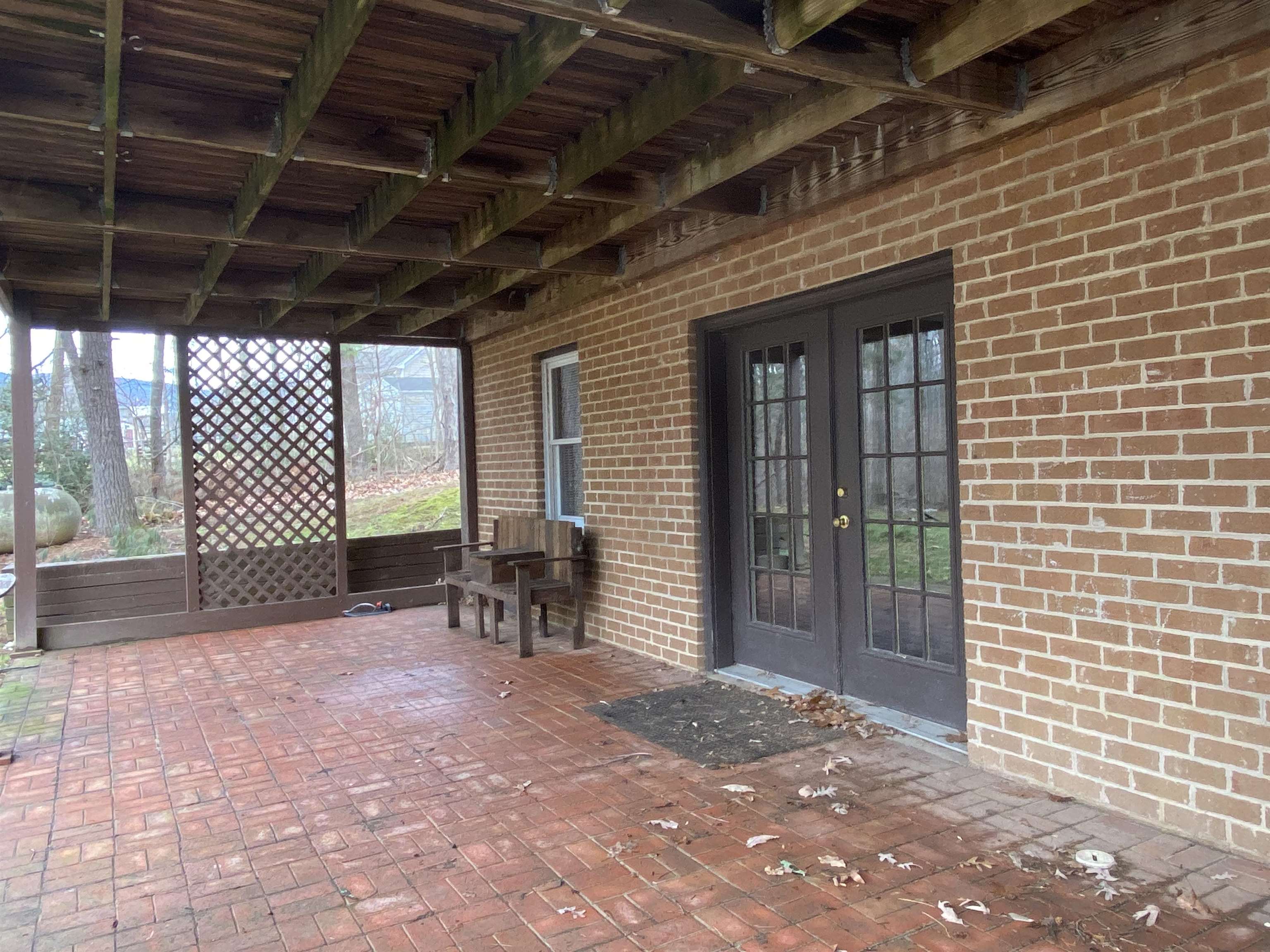 244 Chapel Road Churchville, VA 24421 - Photo 12 of 32 a view of a porch with a table and chairs