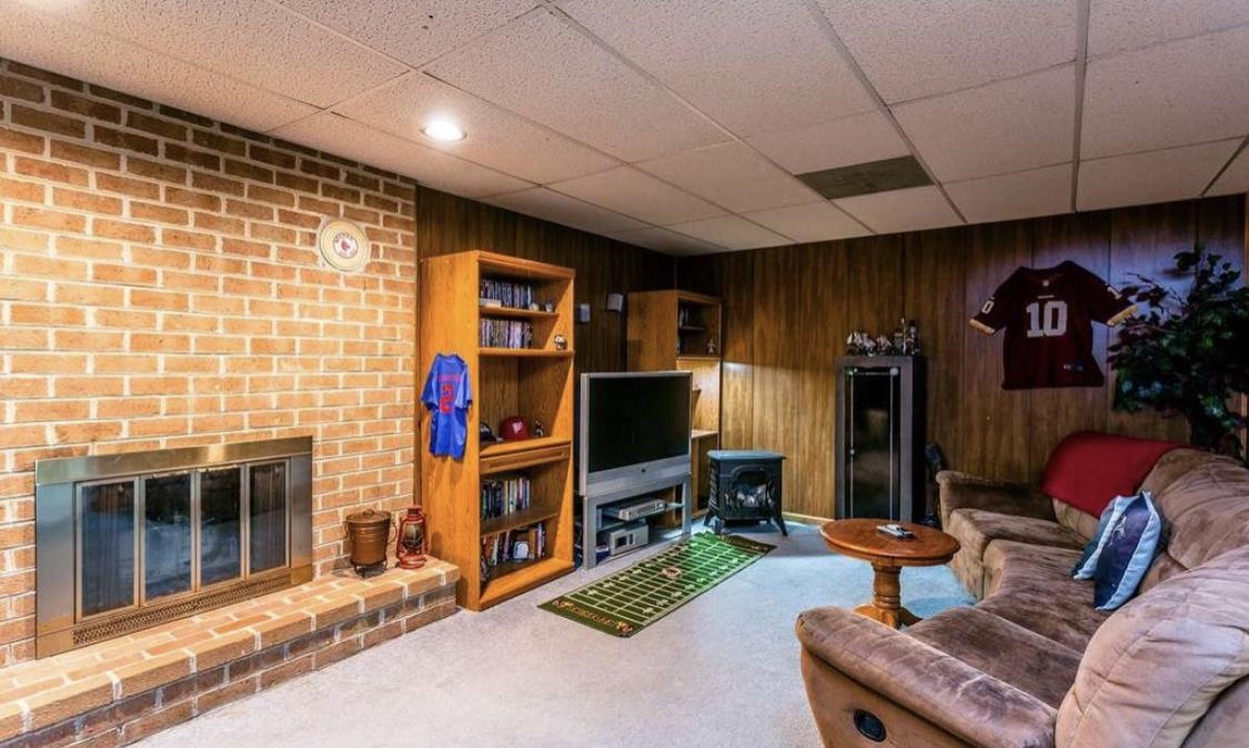 244 Chapel Road Churchville, VA 24421 - Photo 30 of 32 a living room with furniture a flat screen tv and kitchen view