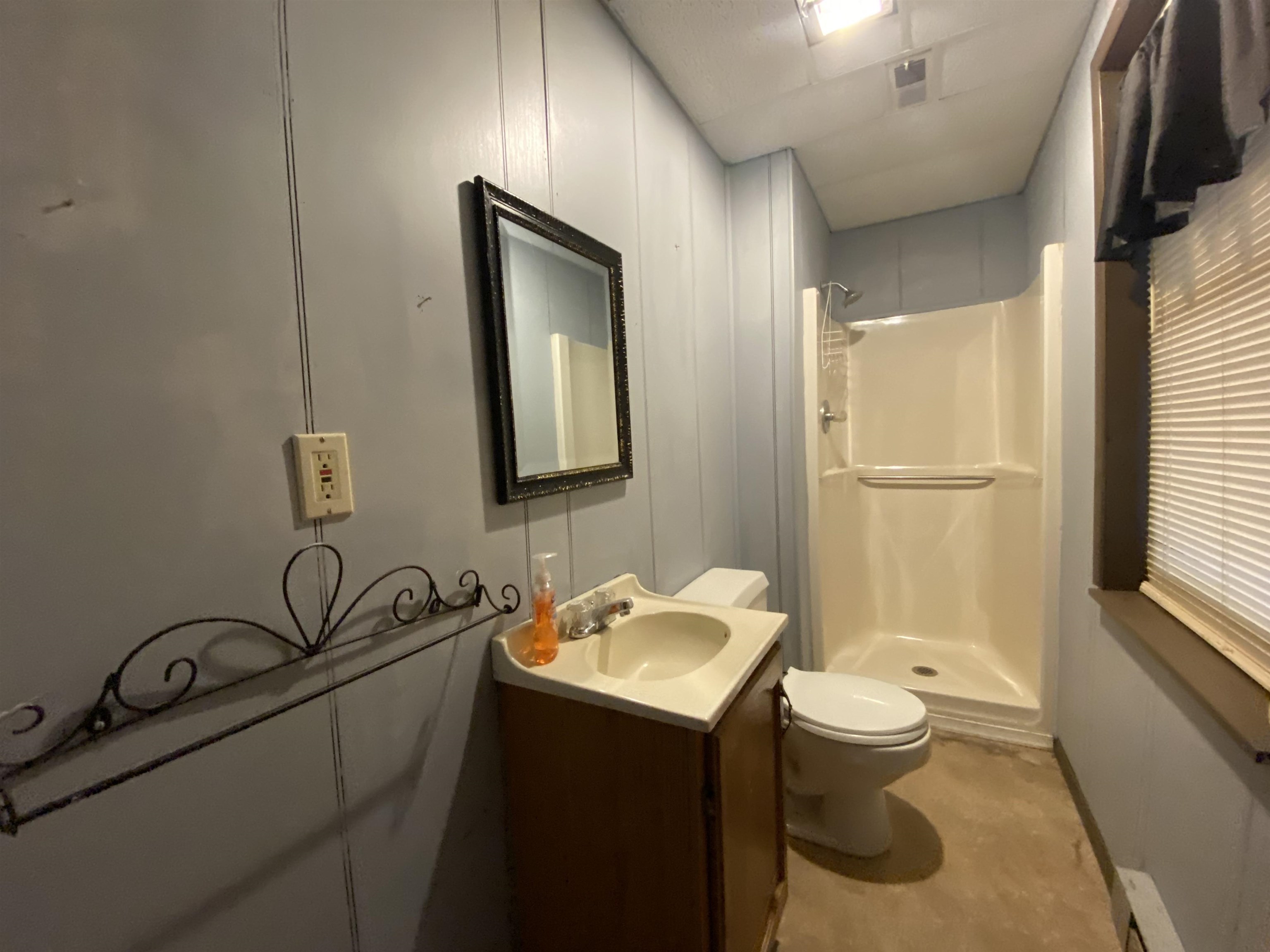 244 Chapel Road Churchville, VA 24421 - Photo 32 of 32 a bathroom with a toilet sink and mirror