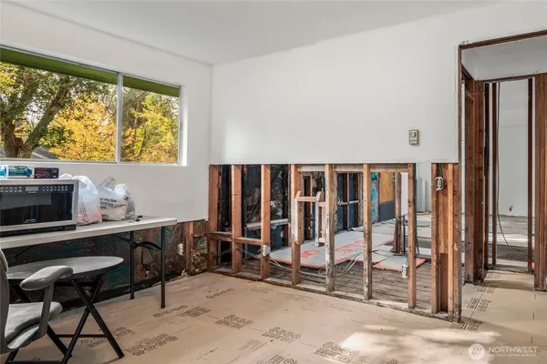a workspace with furniture and a window