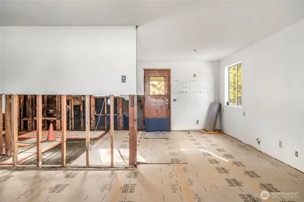 a view of a bedroom with a window