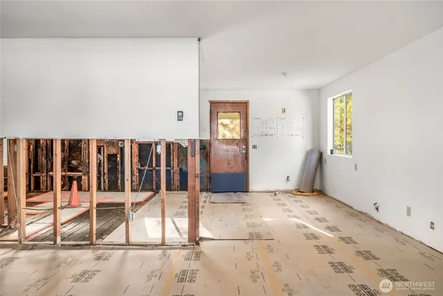 a view of a bedroom with a window