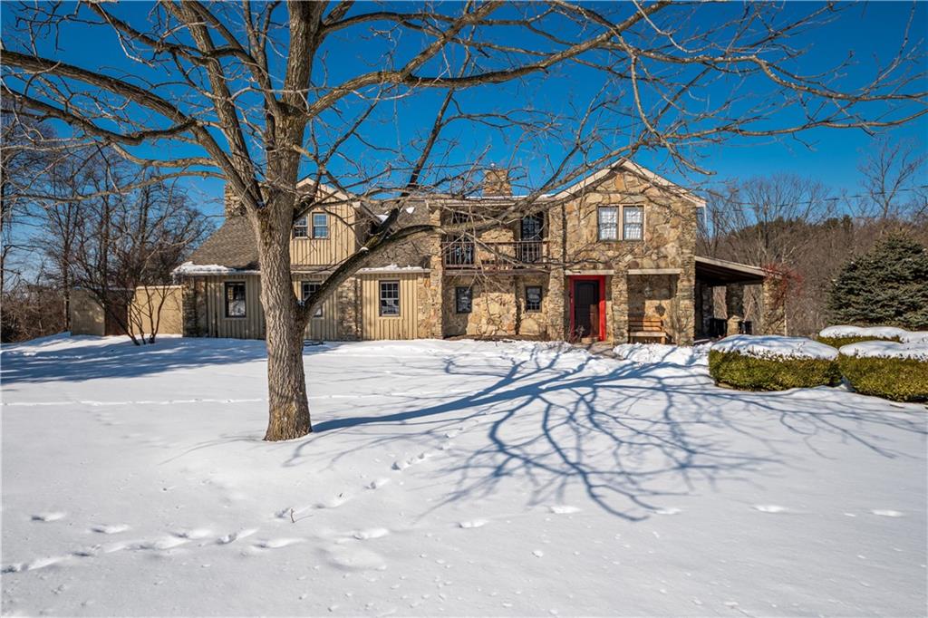a view of a house with a snow