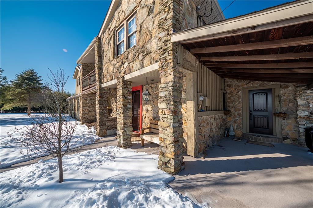 369 Mill Dam Road Cheswick, PA 15024 - Photo 2 of 25 a view of a house with a wooden fence