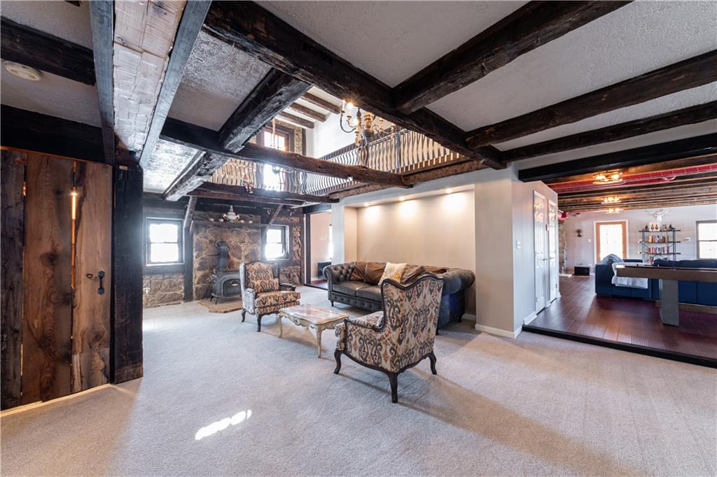 369 Mill Dam Road Cheswick, PA 15024 - Photo 10 of 25 a living room with furniture and a large window