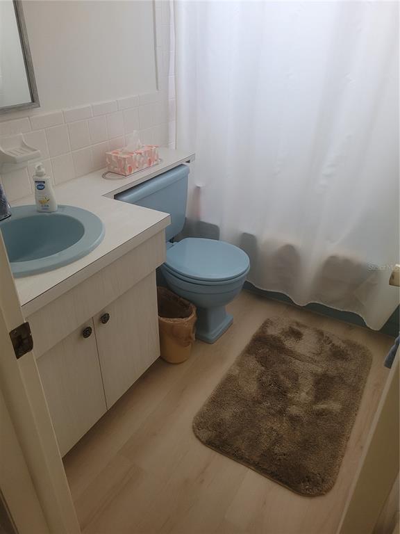 4230 Redcliff Place, Unit 4230 New Port Richey, FL 34652 - Photo 26 of 42 a bathroom with a sink and a toilet