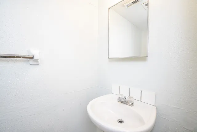 a house view with a garden space