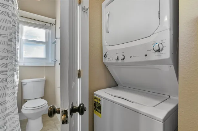 a bathroom with a toilet and a sink