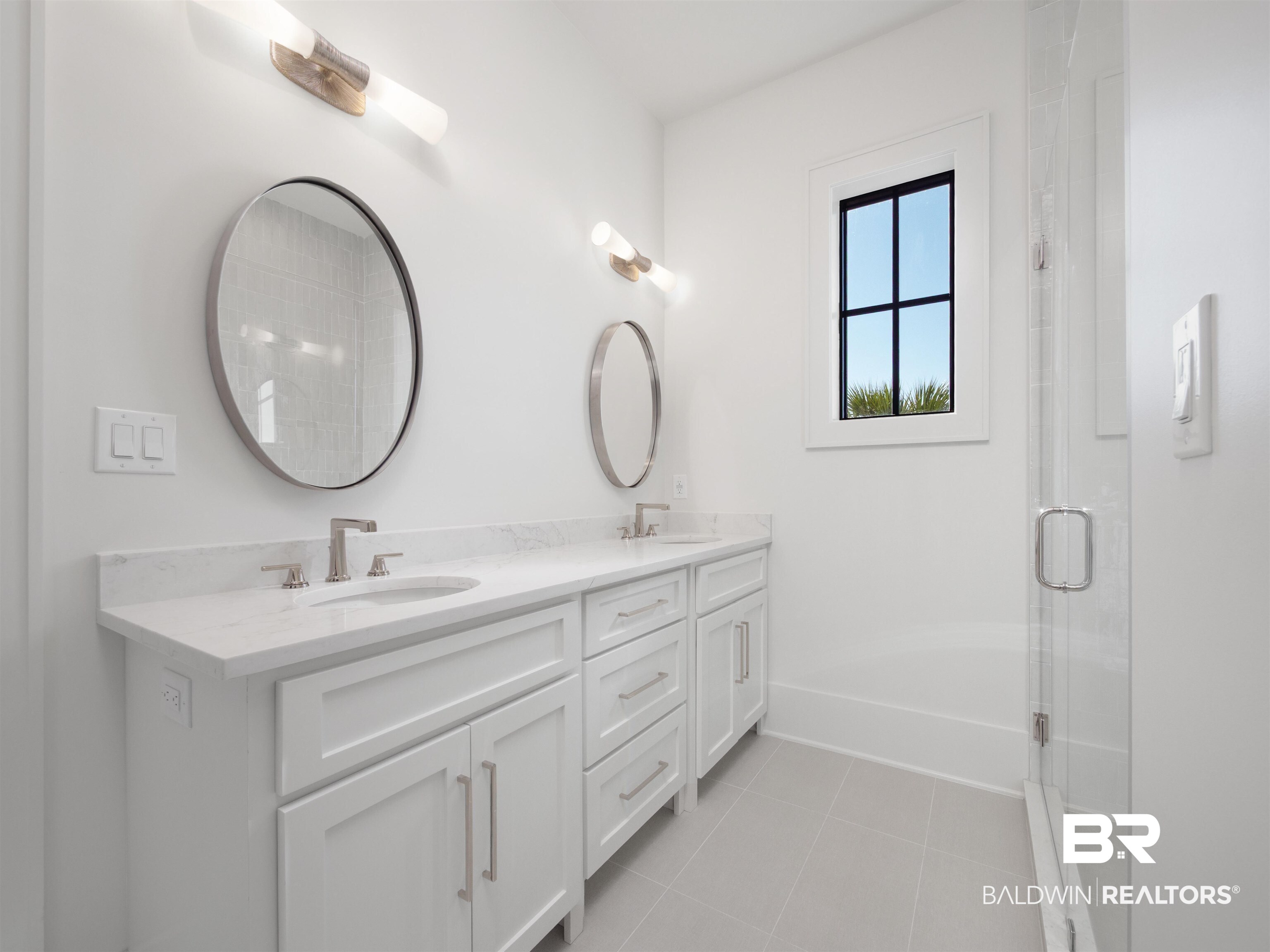 31292 River Road Orange Beach, AL 36561 - Photo 30 of 48 Full bath with tile patterned floors, an enclosed shower, a sink, and double vanity