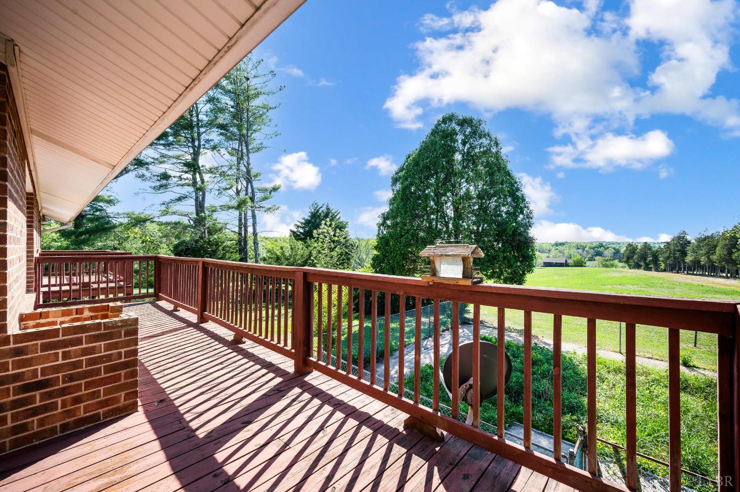 1250 Lick Run Farm Road Forest, VA 24551 - Photo 15 of 74 a view of balcony with wooden floor and fence