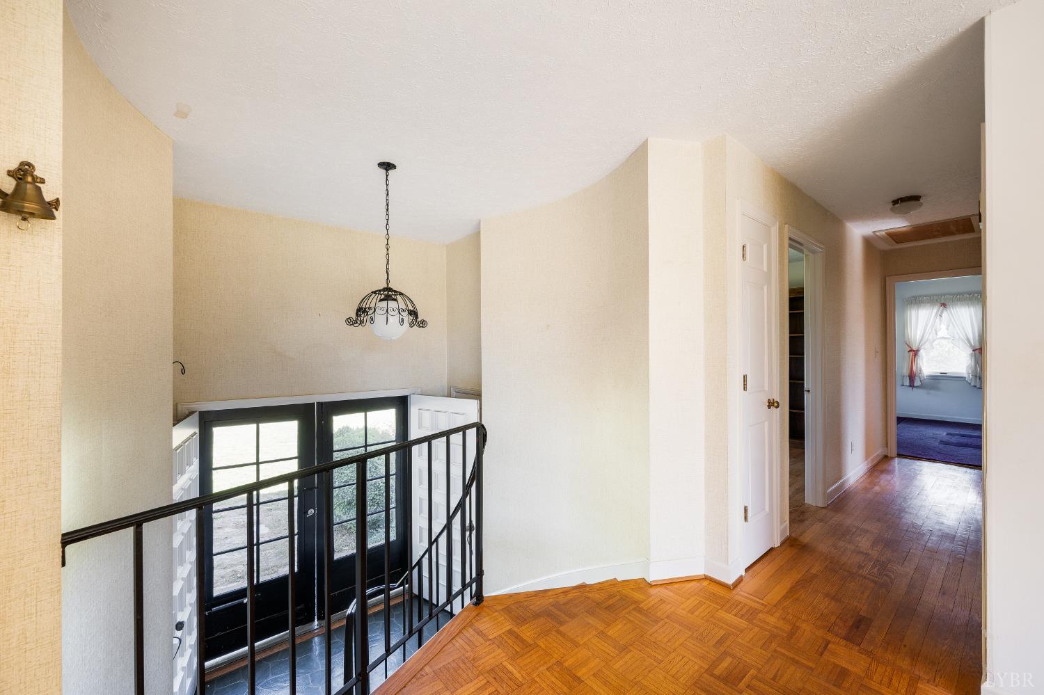 1250 Lick Run Farm Road Forest, VA 24551 - Photo 20 of 74 a view of a hallway with wooden floor and stairs