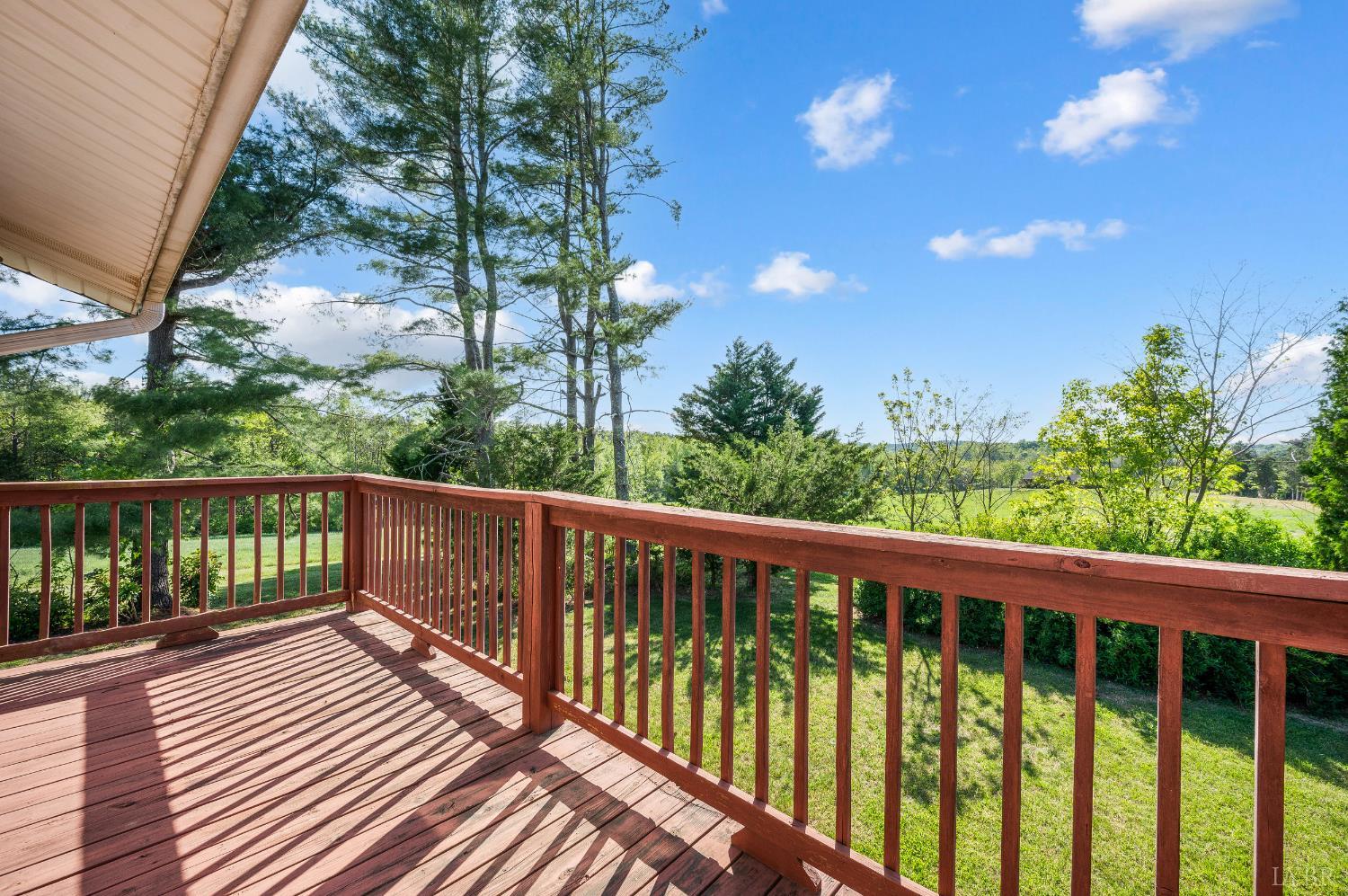 1250 Lick Run Farm Road Forest, VA 24551 - Photo 24 of 74 a balcony with wooden floor and outdoor space