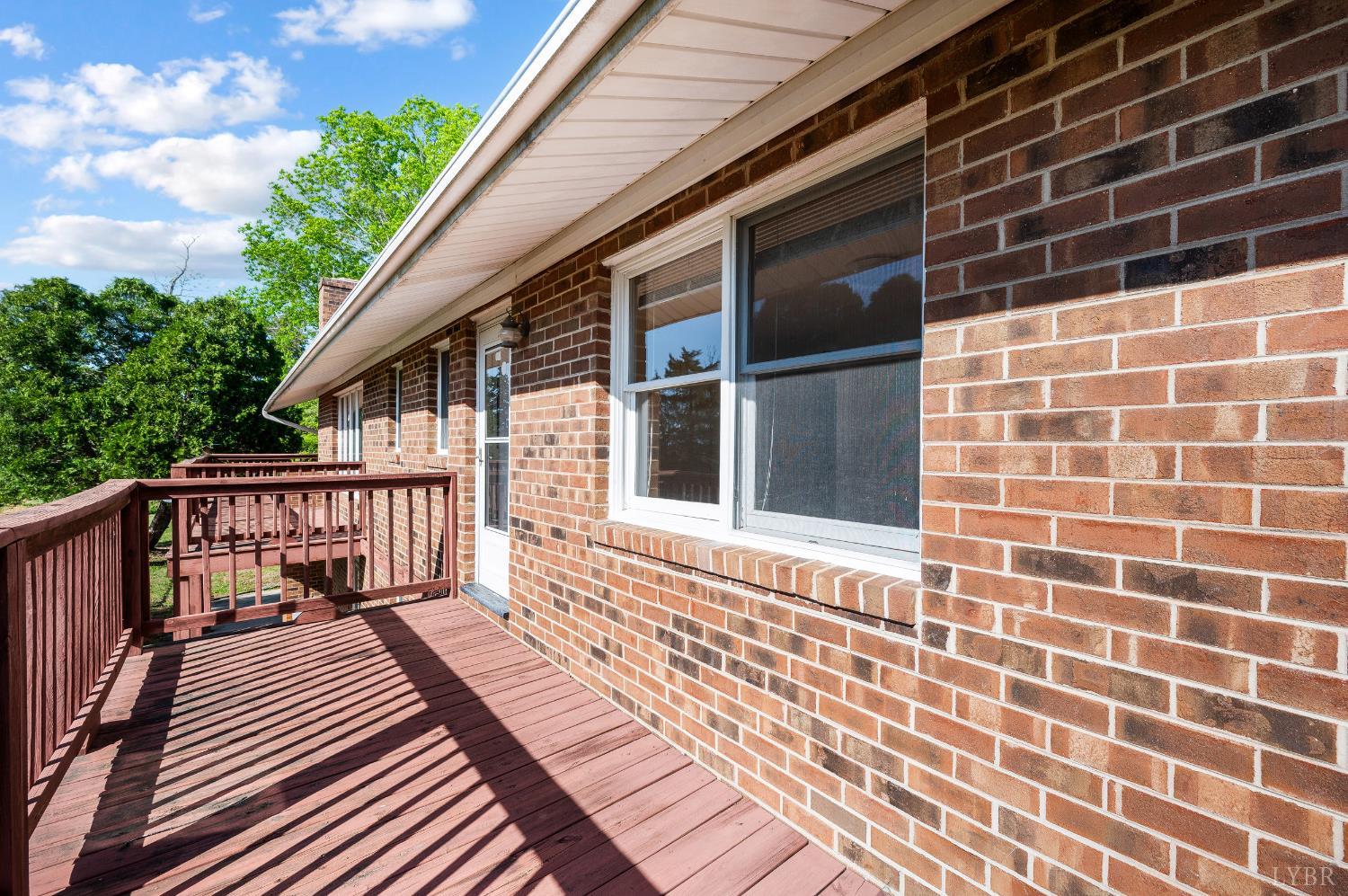 1250 Lick Run Farm Road Forest, VA 24551 - Photo 26 of 74 a view of a balcony with wooden floor