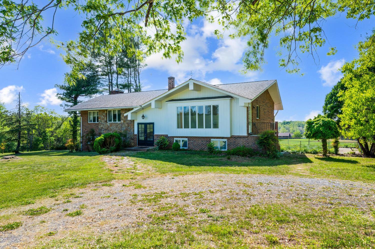 1250 Lick Run Farm Road Forest, VA 24551 - Photo 46 of 74 a front view of a house with garden