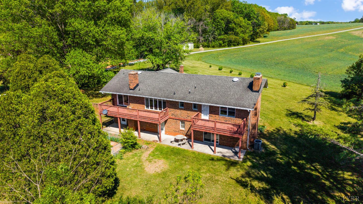 1250 Lick Run Farm Road Forest, VA 24551 - Photo 64 of 74 an aerial view of a house with a big yard