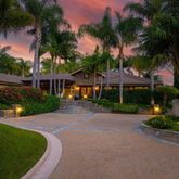 front view of a house with a garden