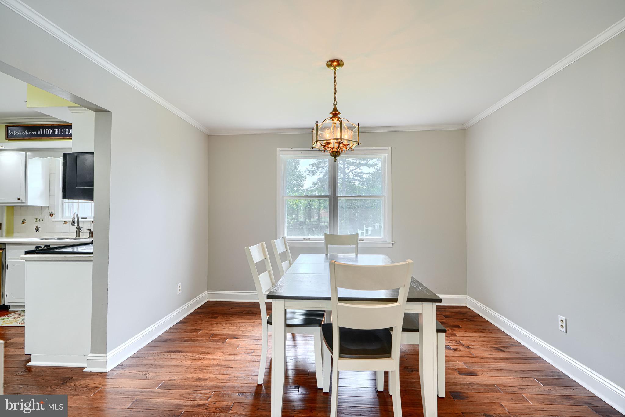 4225 Chapel Road Perry Hall, MD 21128 - Photo 11 of 65 a view of a dining room with furniture window and wooden floor
