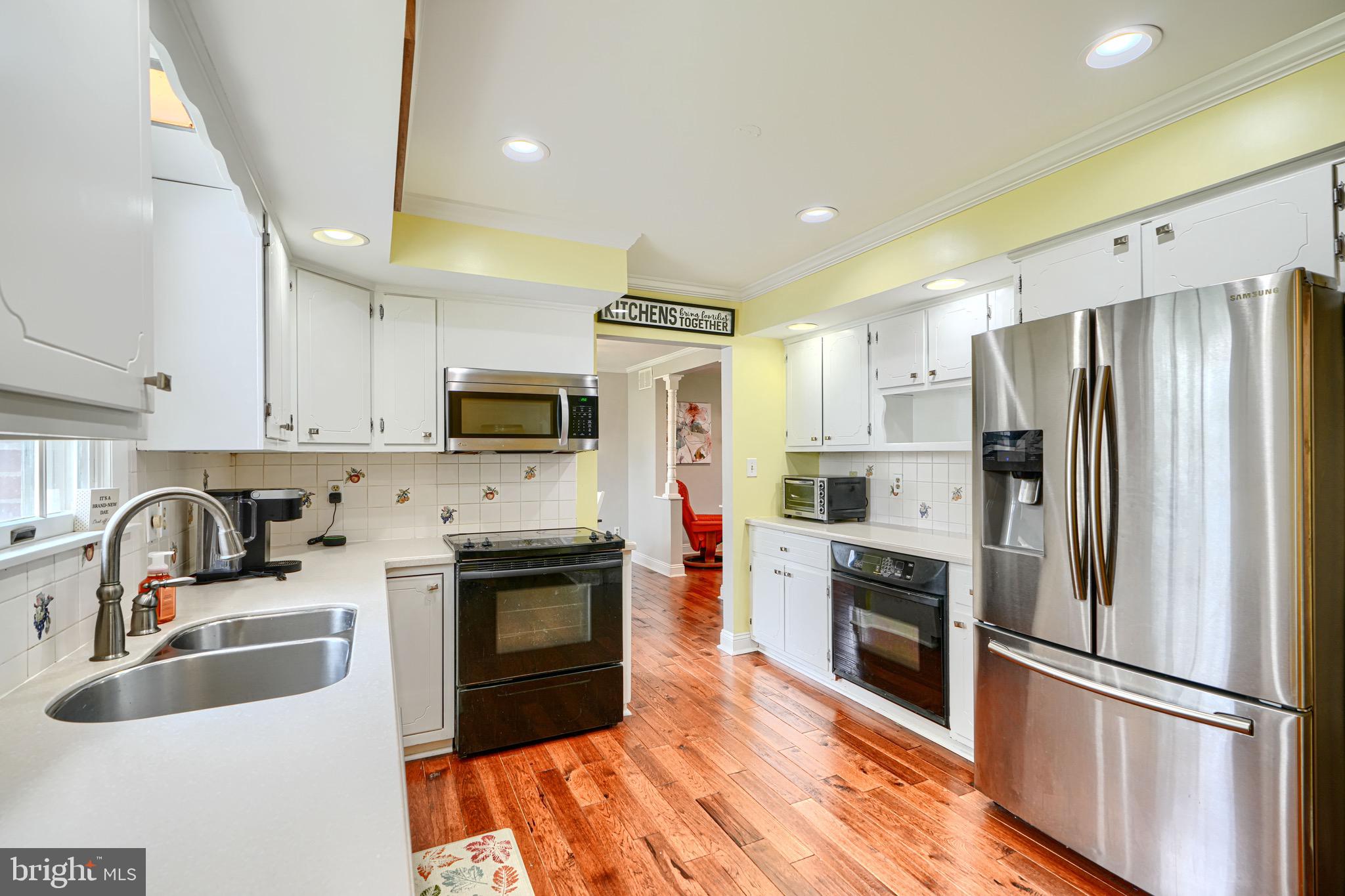 4225 Chapel Road Perry Hall, MD 21128 - Photo 17 of 65 a kitchen with stainless steel appliances a refrigerator sink and microwave