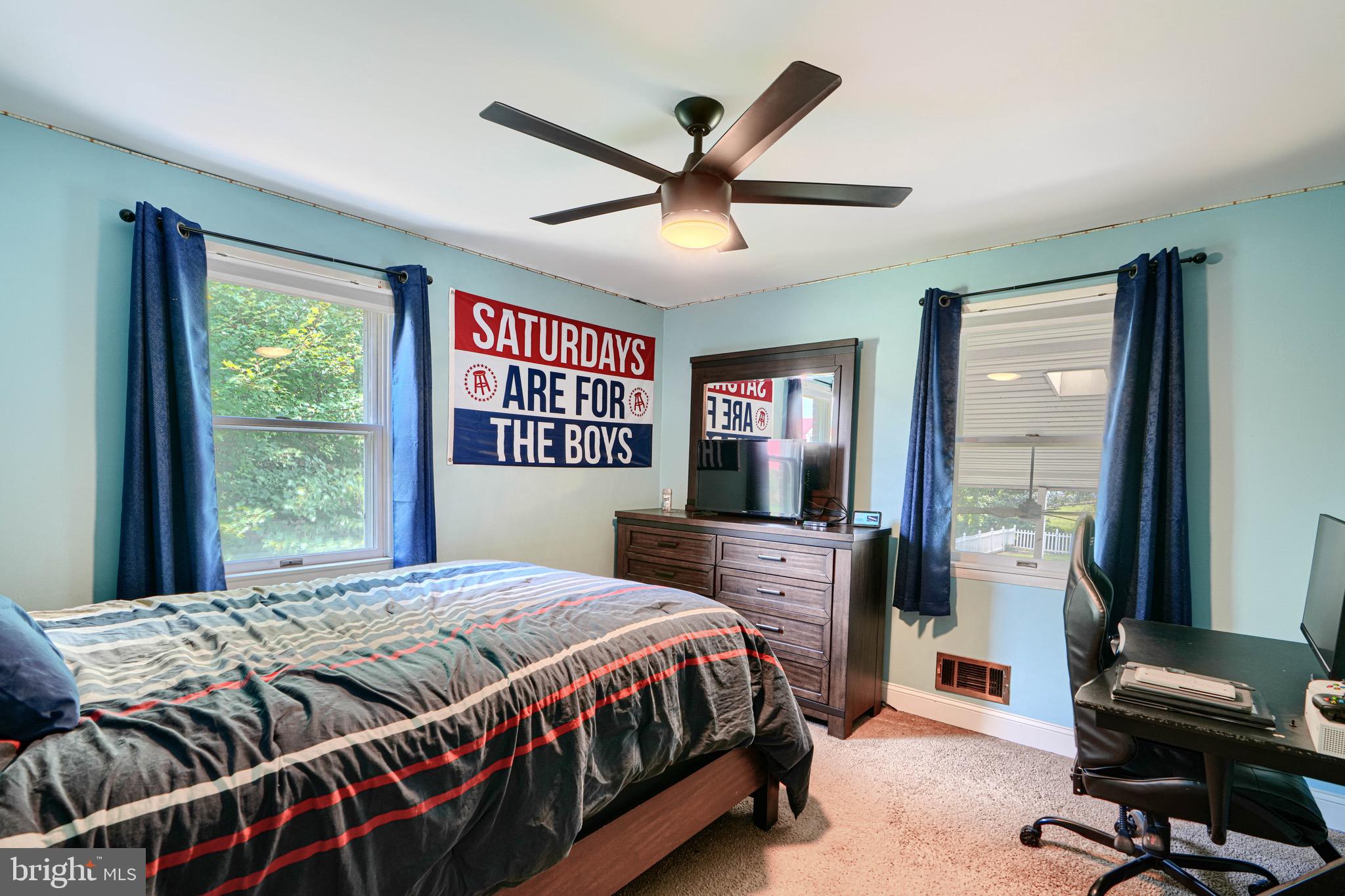 4225 Chapel Road Perry Hall, MD 21128 - Photo 26 of 65 a bedroom with a bed and a window