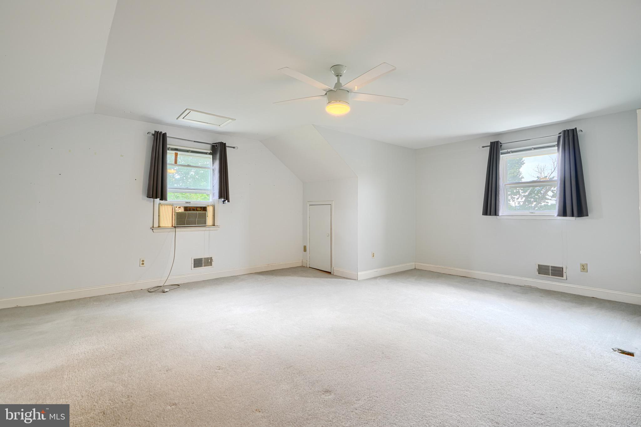 4225 Chapel Road Perry Hall, MD 21128 - Photo 35 of 65 an empty room with windows and fan