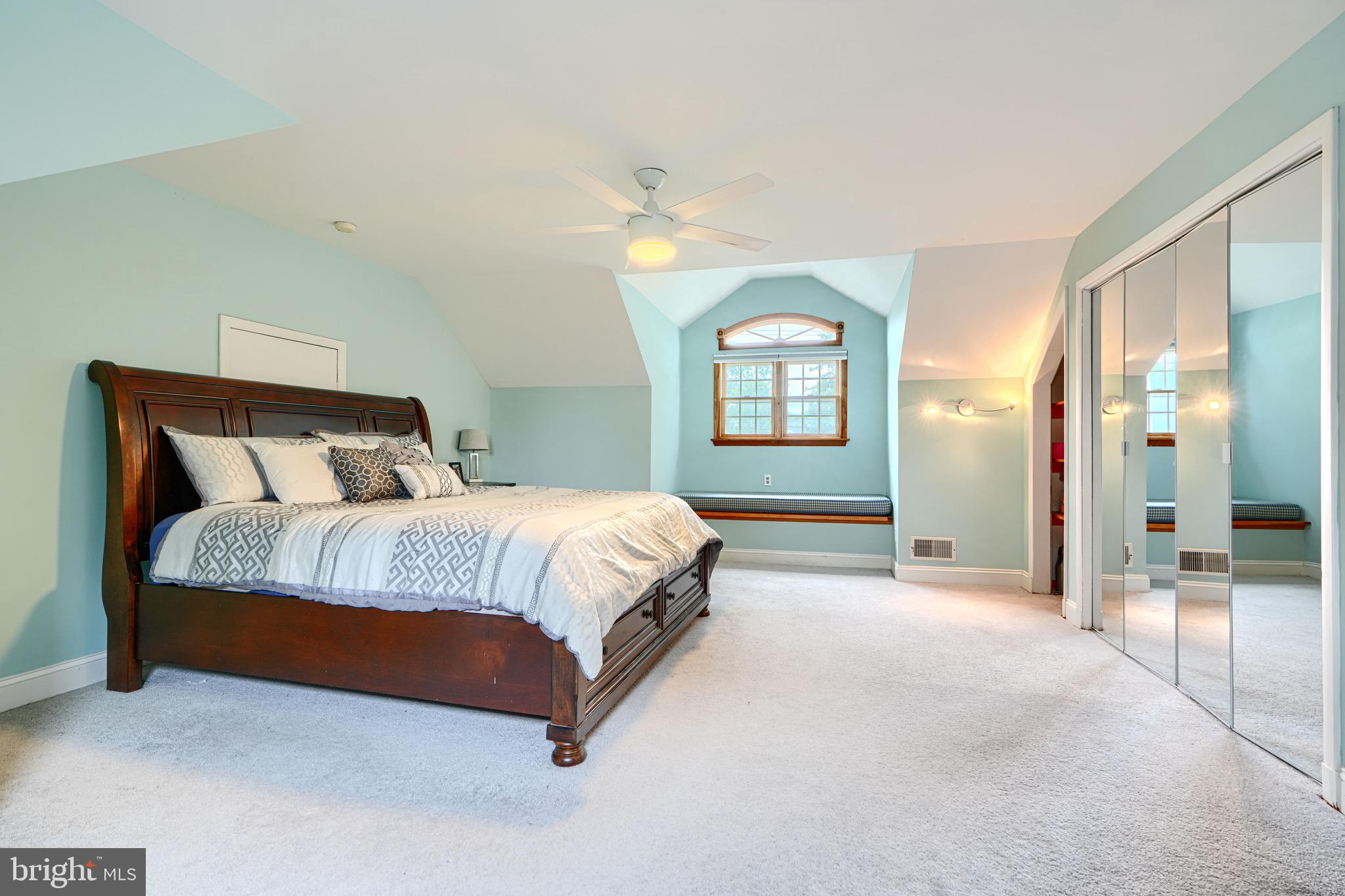 4225 Chapel Road Perry Hall, MD 21128 - Photo 37 of 65 a spacious bedroom with a bed and glass door