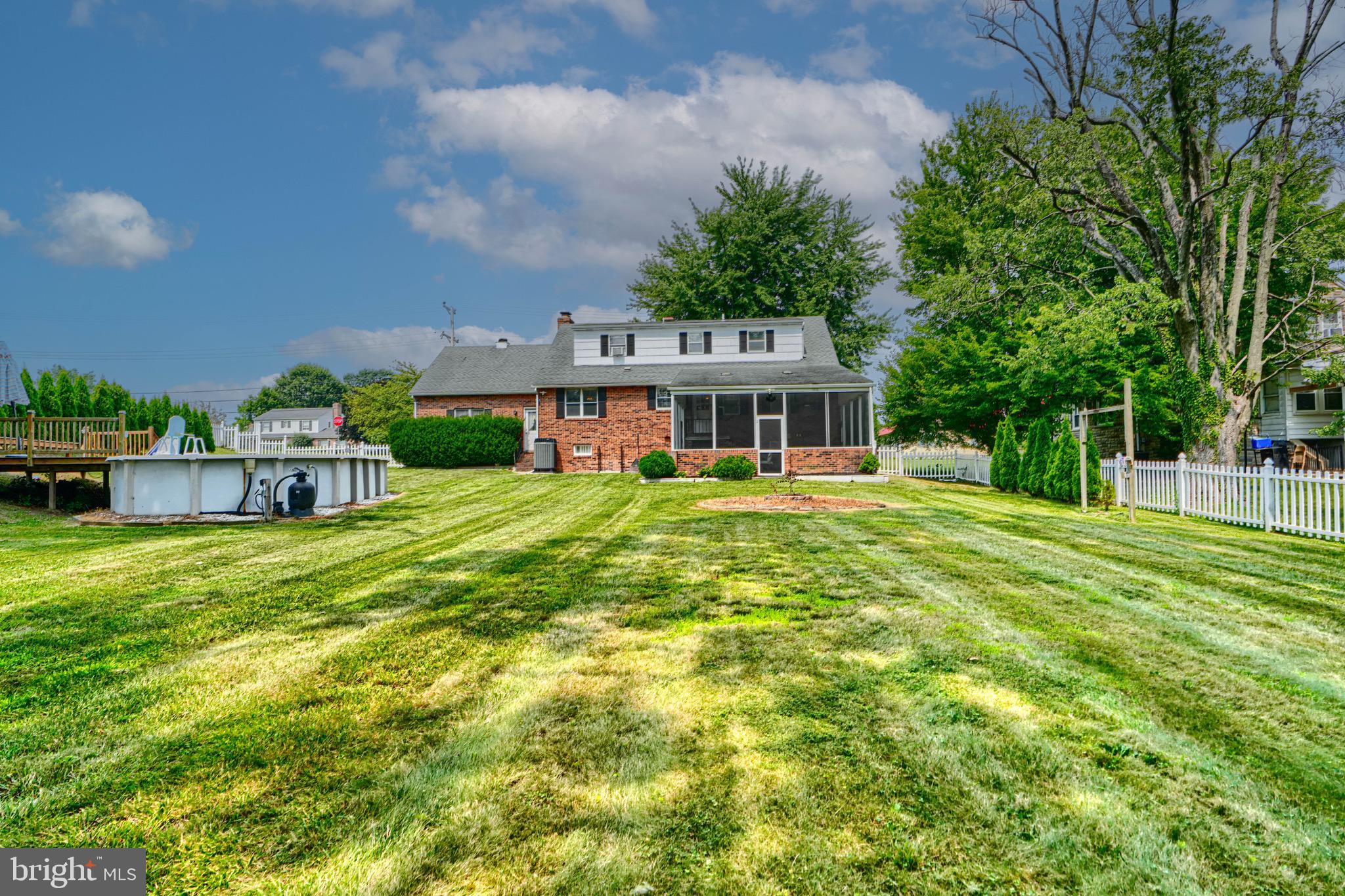 4225 Chapel Road Perry Hall, MD 21128 - Photo 57 of 65 a view of house with yard and outdoor seating