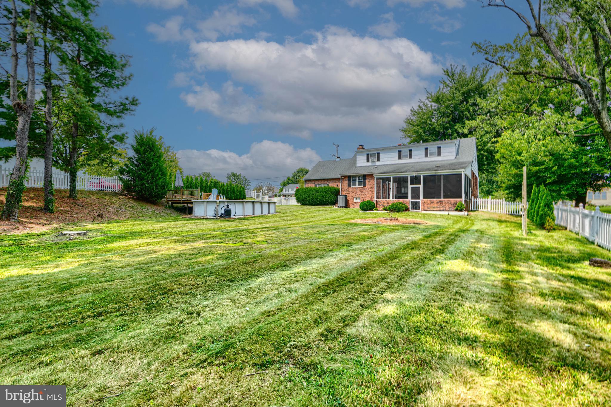 4225 Chapel Road Perry Hall, MD 21128 - Photo 58 of 65 a view of a house with a yard