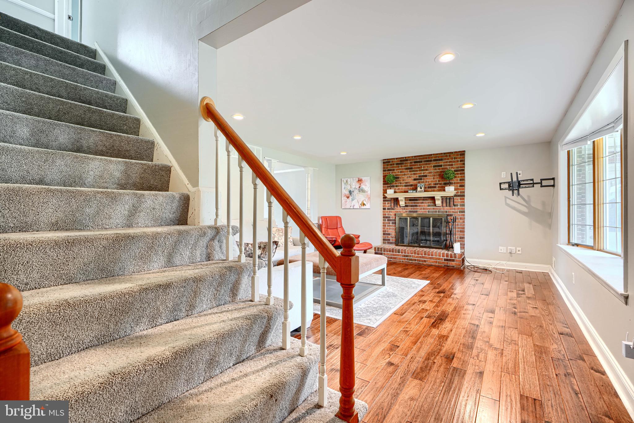4225 Chapel Road Perry Hall, MD 21128 - Photo 6 of 65 a view of staircase with wooden floor and a window